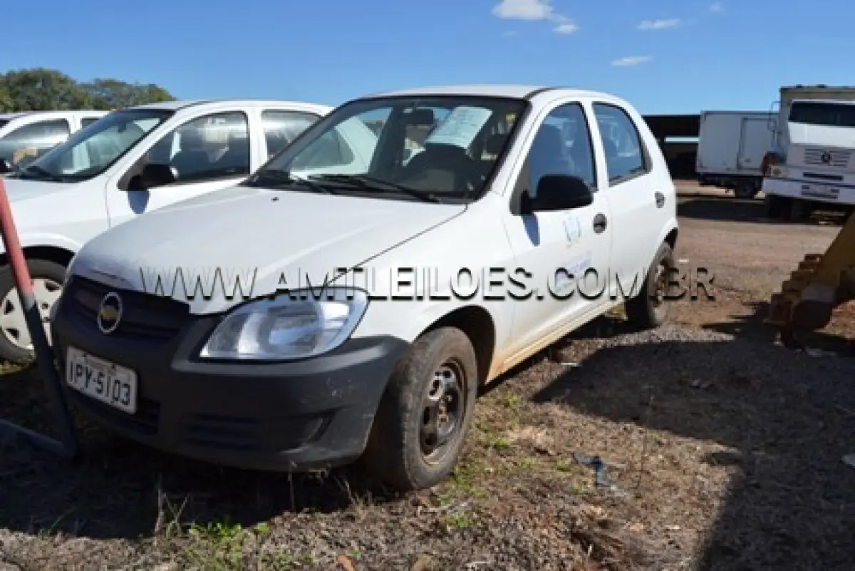 LOTE 014 - Automóvel Celta, Marca GM, modelo 4 portas Life, ano de fabricação 2009, modelo 2010, chassi nº 9BGRZ4810AG139987, cor branca, Placa IPY 5103