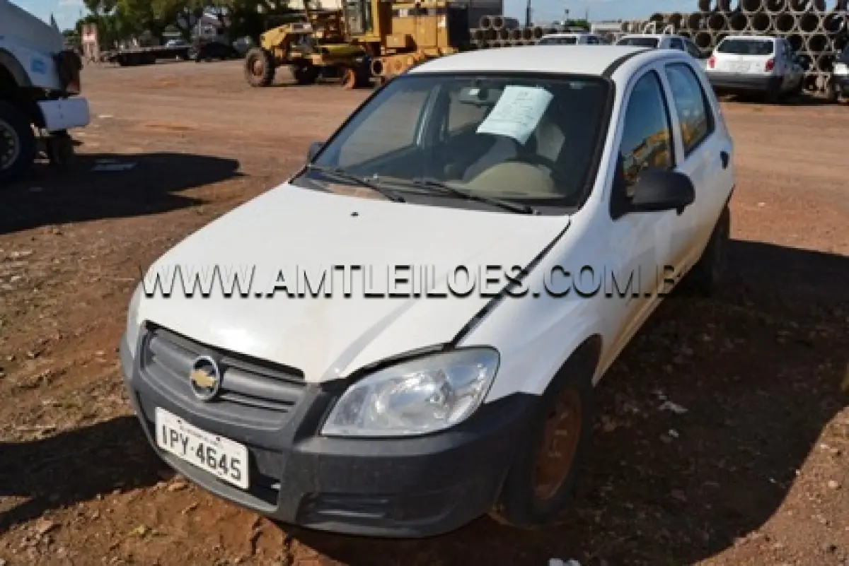 LOTE 012 - Automóvel Celta, Marca GM, modelo 4 portas Life, ano de fabricação 2009, modelo 2010, chassi nº 9BGRZ4810AG140107, cor branca, Placa IPY 4645