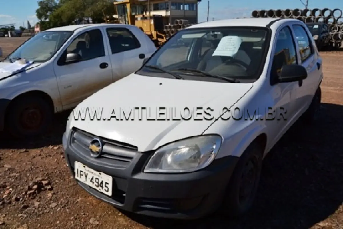 LOTE 015 - Automóvel Celta, Marca GM, modelo 4 portas Life, ano de fabricação 2009, modelo 2010, chassi nº 9BGRZ4810AG140059, cor branca, Placa IPY 4945