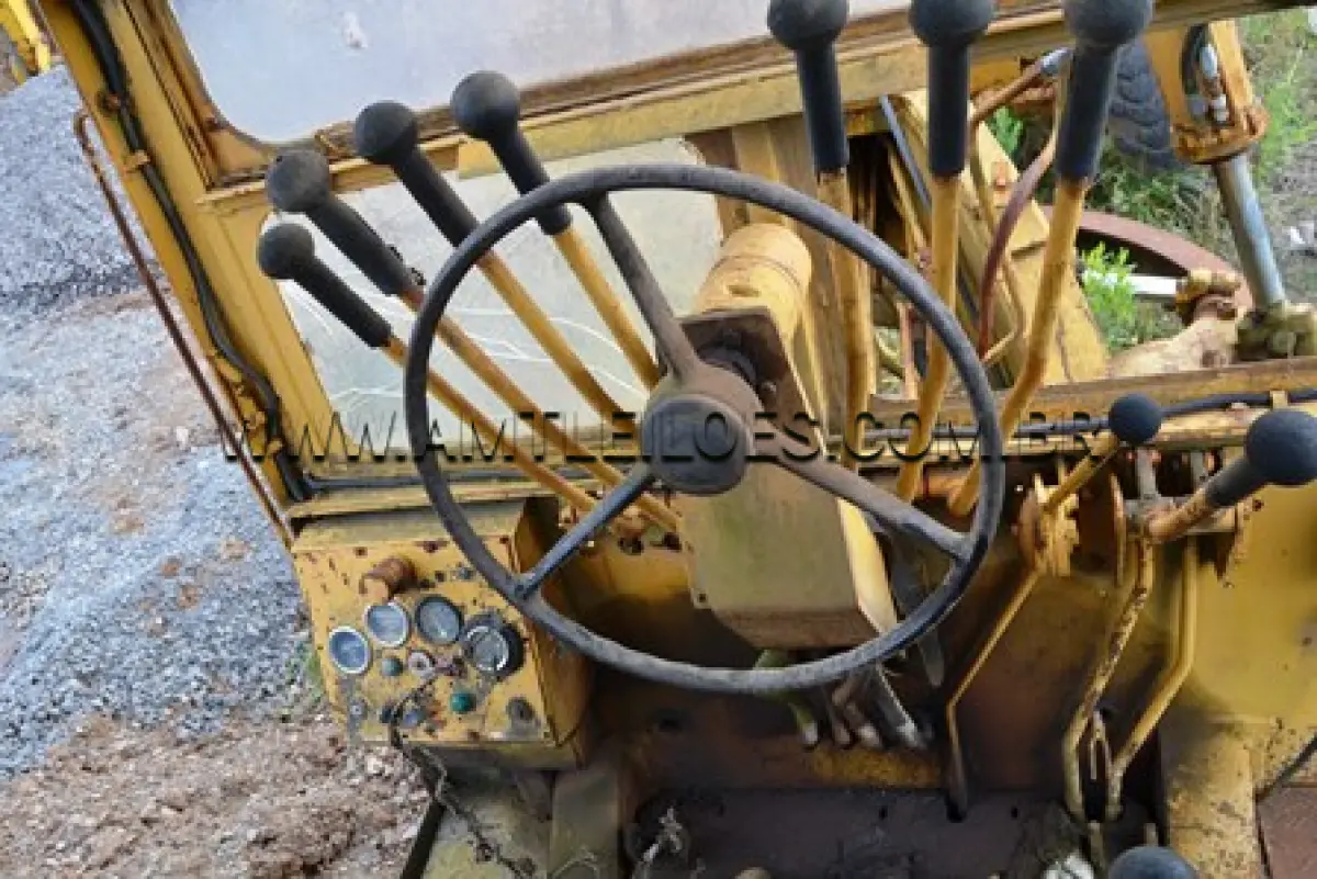 LOTE 004 - MOTONIVELADORA,  HUBER WARCO/ 165S,  N/S 390, NÚMERO 04