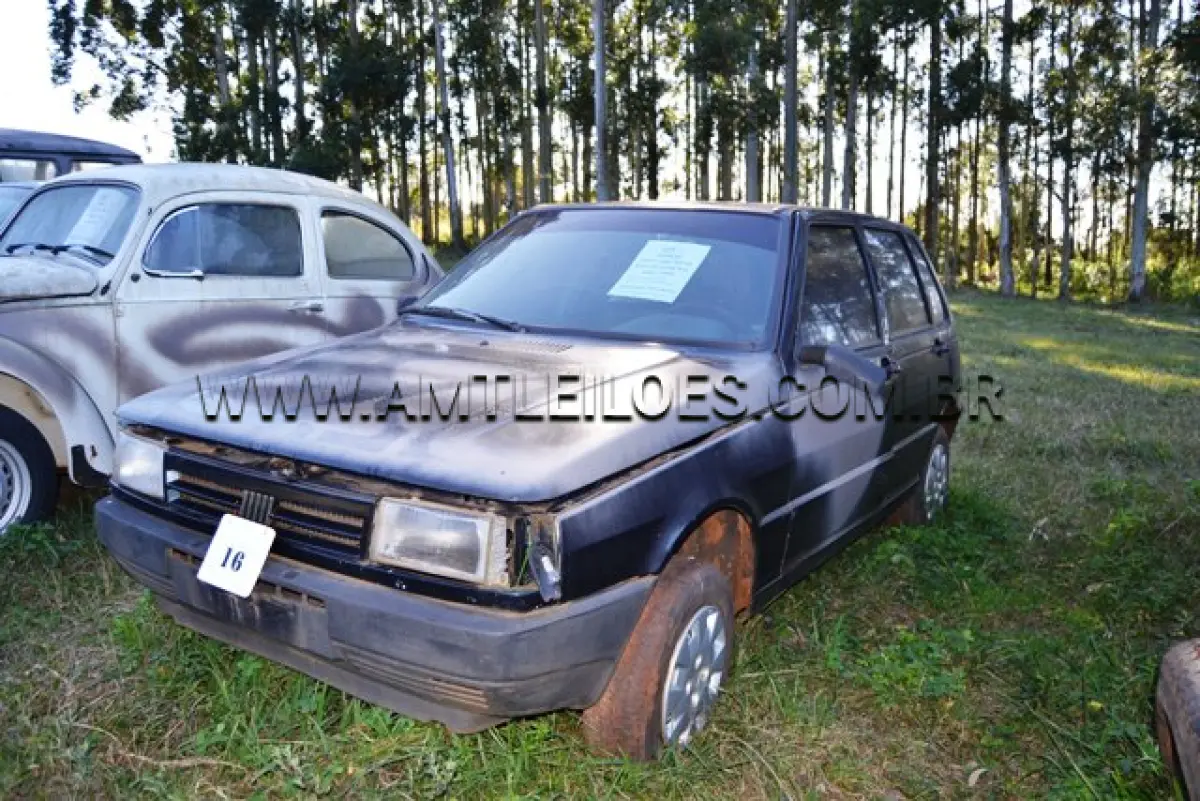 LOTE 016 - MARCA/MODELO: FIAT UNO MILLE/ EP, 5 Psg, 4 x 2 ANO: 1995 CHASSI: 9BD146107S5630001 MOTOR: 4 Cil. nº 146ª70114451784