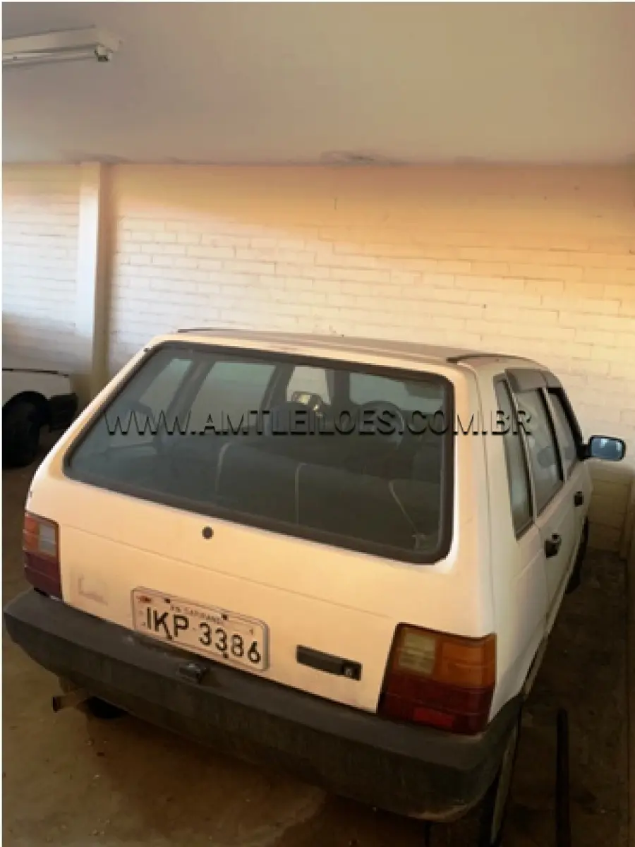 LOTE 015 - MARCA/MODELO: FIAT/UNO MILLE FIRE PLACA: IKP 3386 FABRICAÇÃO/MODELO: 2002 RENAVAM: 780224825 COR: BRANCA COMBUSTÍVEL: GASOLINA