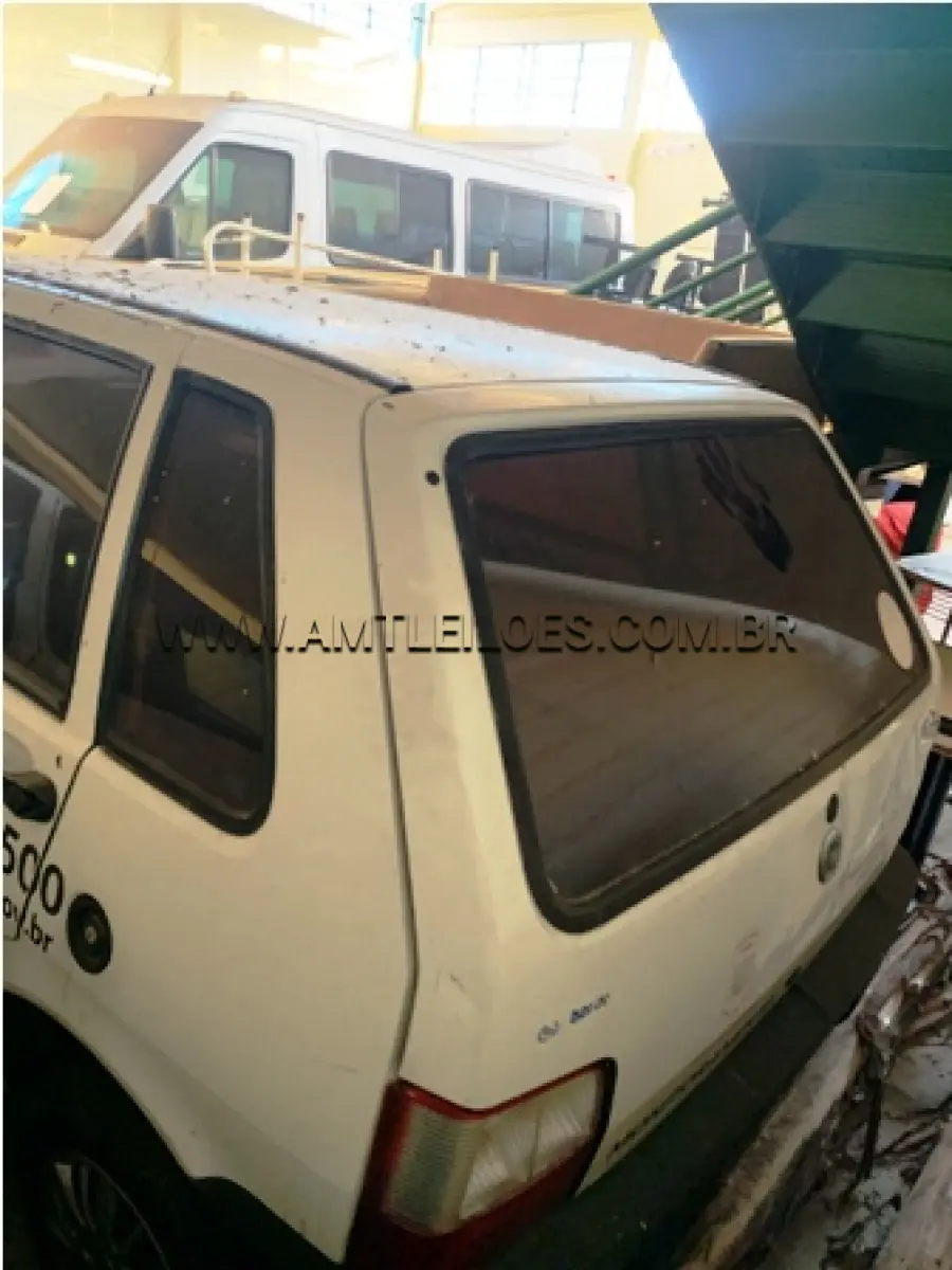 LOTE 002 - MARCA/MODELO: FIAT/UNO MILLE FIRE PLACA: ILX 3028 FABRICAÇÃO/MODELO: 2004 RENAVAM: 831424230 COR: BRANCA COMBUSTÍVEL: GASOLINA - SEM MOTOR