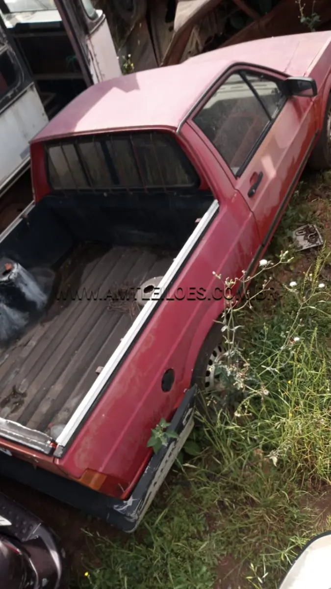 LOTE 004 - SUCATA: VW/SAVEIRO CLI, Placa: IGA 9656, UF: RS Ano: 1997; Cor: Vermelha, RENAVAM: 670036285, Chassi: 9BWZZZ308VP006071/ Motor: UNE004408.