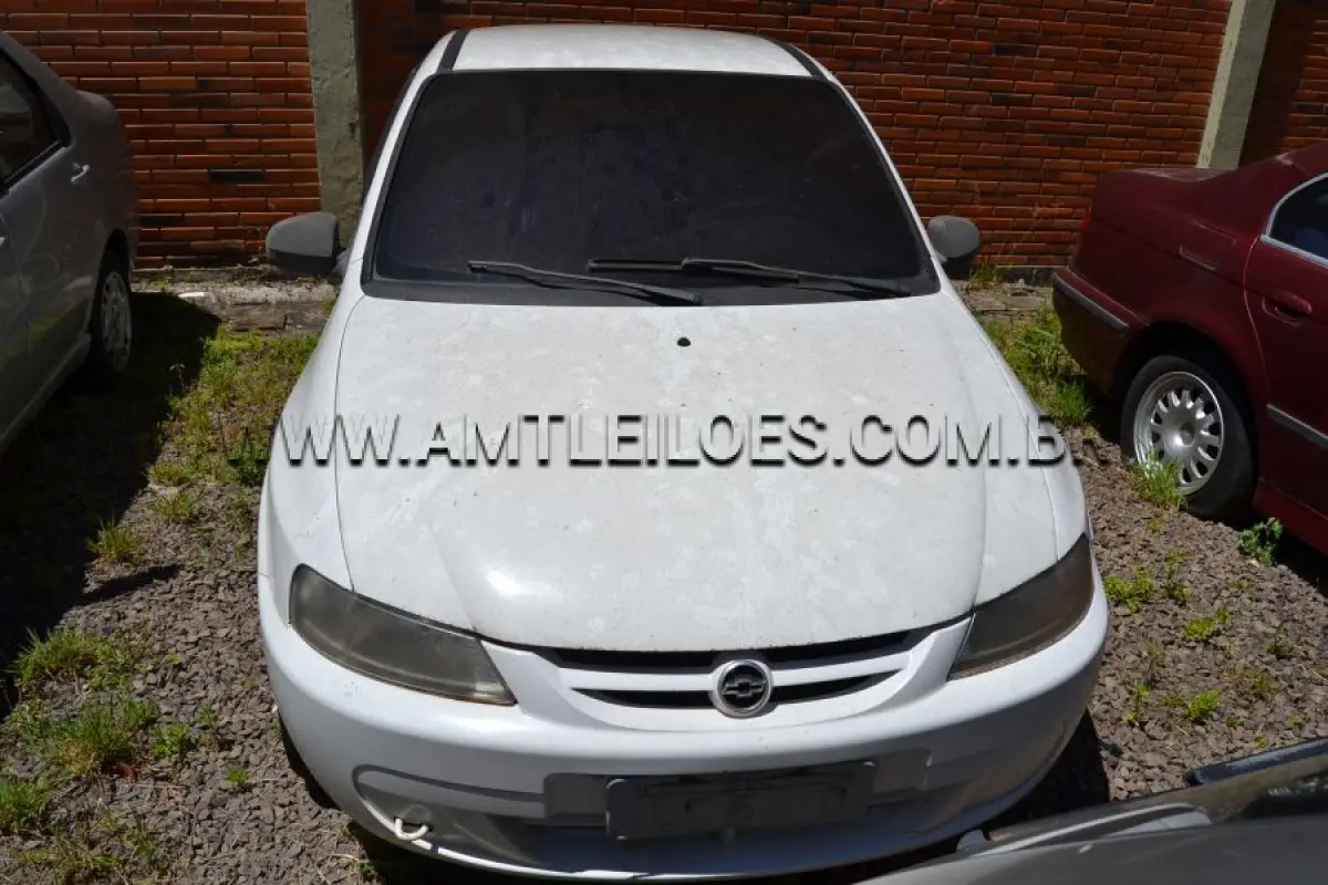 LOTE 013 - GM/CELTA 5 PORTAS SUPER, Placa: ILC 5610, UF: RS Ano: 2003; Cor: Branca, RENAVAM: 800926170 Chassi: 9BGRD48X03G174595/ Motor: 9E0052821.