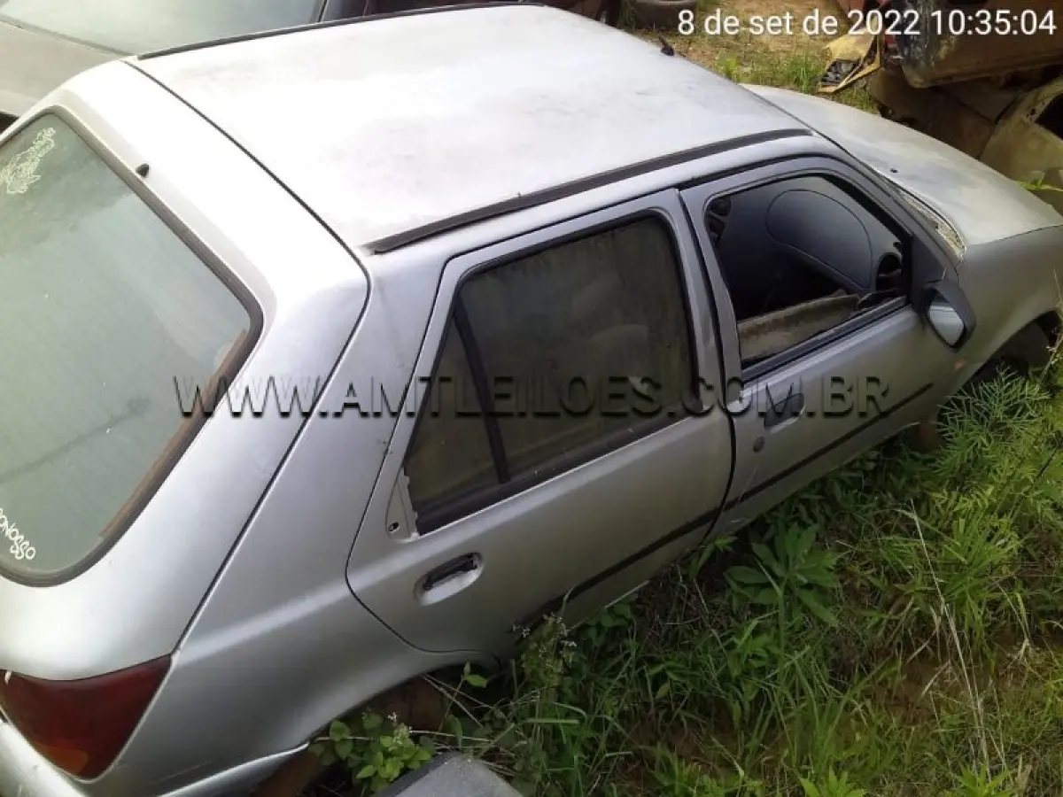 LOTE 012 - SUCATA - FORD/FIESTA, Placa: IIE 3430, UF: RS; Ano/Mod: 1998; Cor: Prata, Chassi: 9BFZZZFHAWB206976; Motor: C4AW206976.