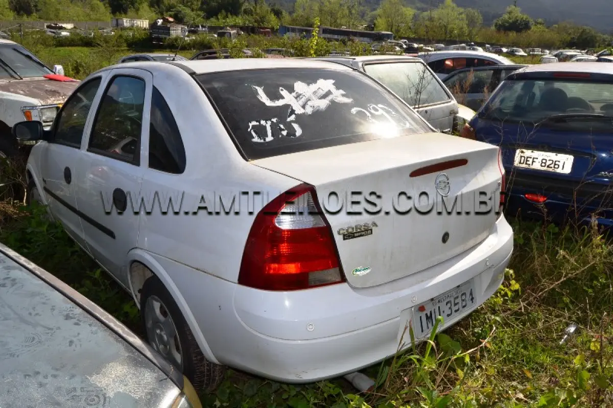 LOTE 011 - GM/CORSA SEDAN MAXX, Placa: IMU3584, UF: RS; Ano/Mod: 2005; Cor: Branca, RENAVAM: 869835963; Chassi: 9BGXH19G06B149649; Motor: G50007896
