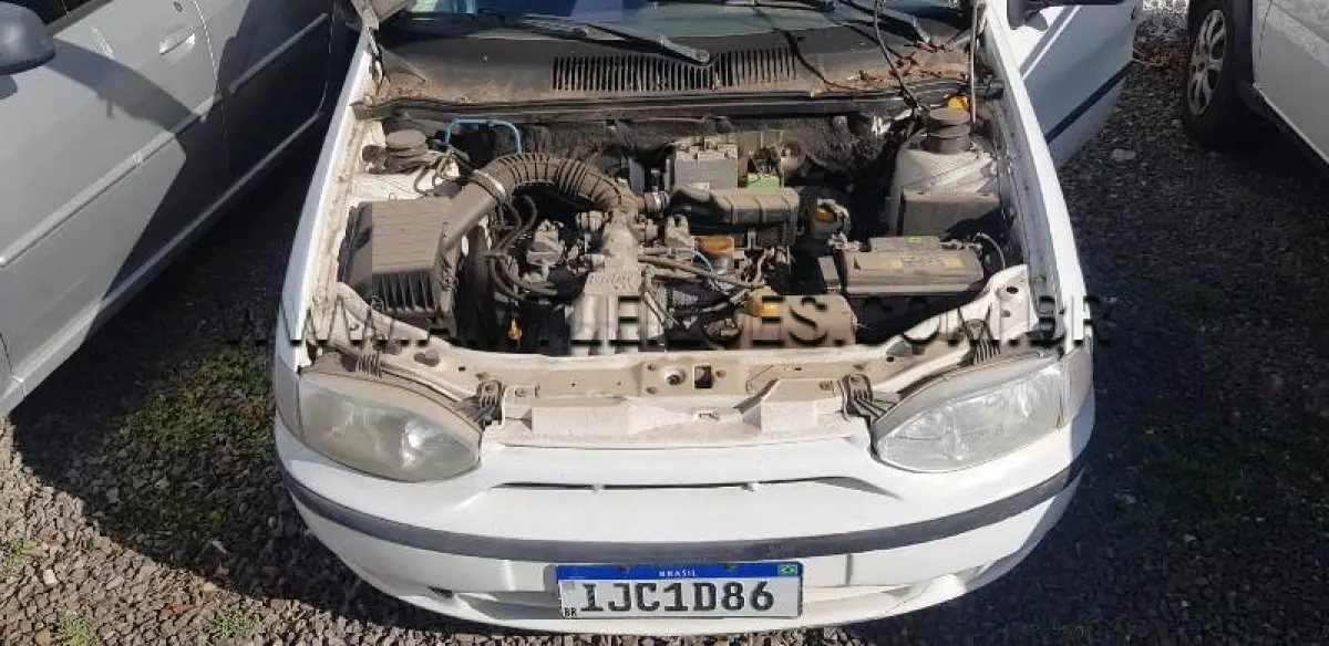 LOTE 012 - Espécie: AUTOMOVEL / Marca: FIAT / Modelo: PALIO EX / Placa: IJC1D86 / Ano fabricação: 1999 / Ano modelo: 1999 / Cor: BRANCA / Chassi: 9BD178296Y0923201 / Motor: 5790398 / Renavam: 00723038546