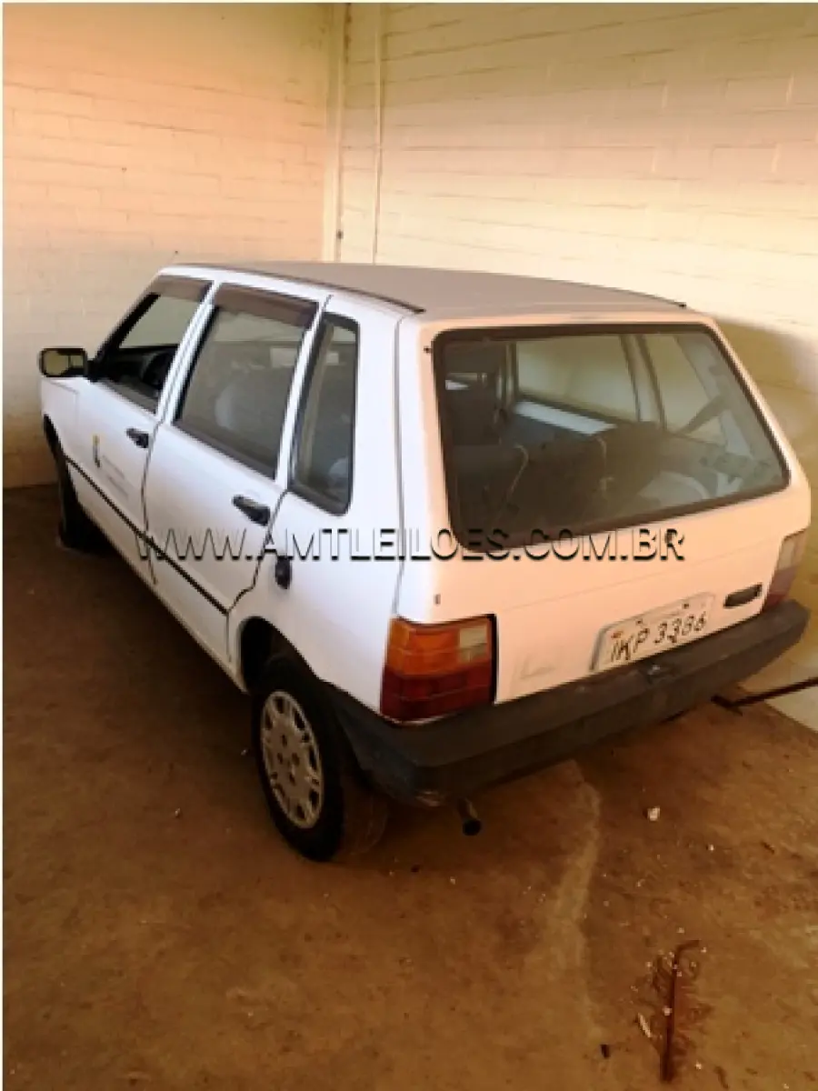 LOTE 015 - MARCA/MODELO: FIAT/UNO MILLE FIRE PLACA: IKP 3386 FABRICAÇÃO/MODELO: 2002 RENAVAM: 780224825 COR: BRANCA COMBUSTÍVEL: GASOLINA