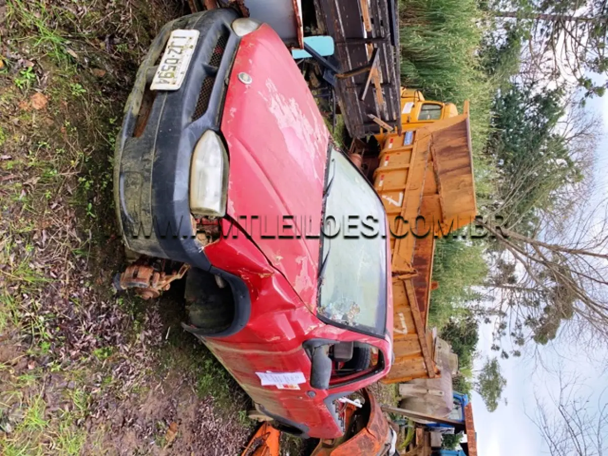 LOTE 019 - MARCA/MODELO: CAMINHONETE FIAT/STRADA WORKING PLACAS: IJZ 0594 ANO: 2001 – COR: VERMELHA RENAVAM: 756531543