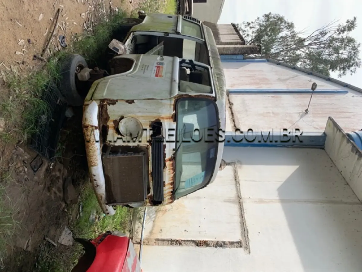 LOTE 026 - MARCA/MODELO: VW/KOMBI STANDARD 1.4 PLACAS: ING 3038 ANO: 2006/2007 – COR: BRANCA RENAVAM: 00891817247