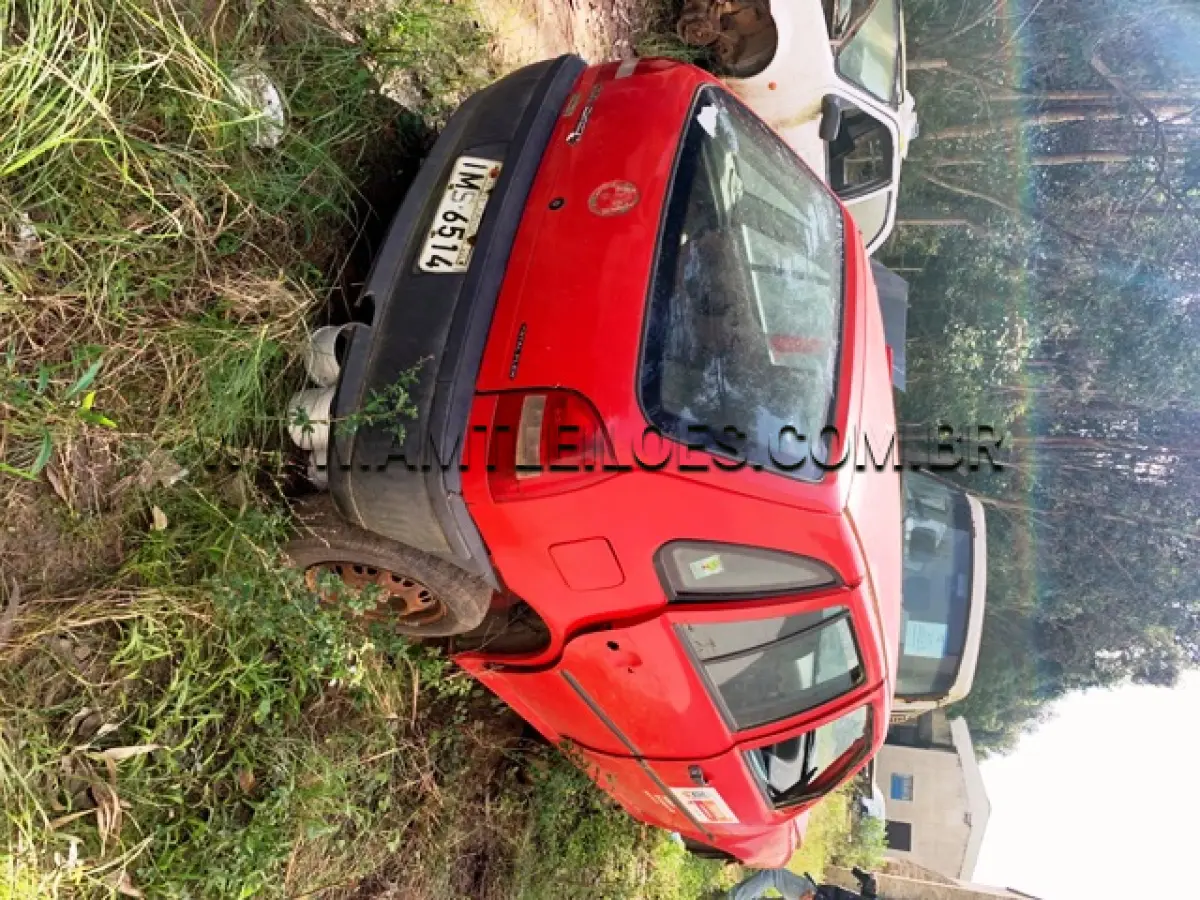 LOTE 025 - MARCA/MODELO: VW/GOL CITY 1.0 PLACAS: IMS 6514 ANO: 2005 – COR: VERMELHA CHASSI: 9BWCA05X95T200600 RENAVAM: 866900225