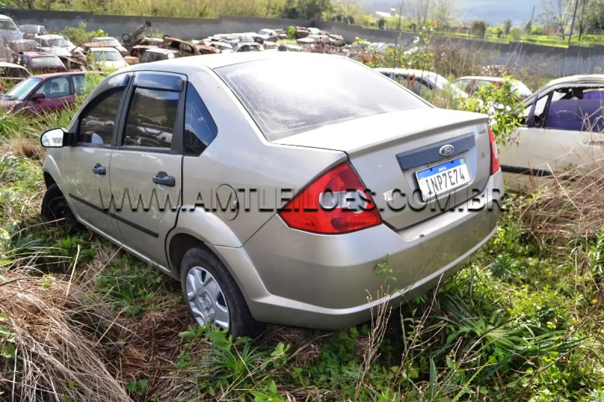 LOTE 010 - FORD/FIESTA SEDAN FLEX, Placa: INP7E74, UF: RS; Ano/Mod: 2006; Cor: Prata, RENAVAM: 908840829; Chassi: 9BFZF20A478034969; Motor: SMJA78034969.