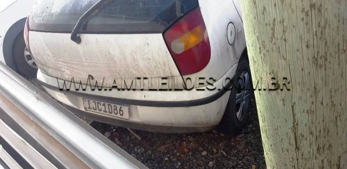 LOTE 012 - Espécie: AUTOMOVEL / Marca: FIAT / Modelo: PALIO EX / Placa: IJC1D86 / Ano fabricação: 1999 / Ano modelo: 1999 / Cor: BRANCA / Chassi: 9BD178296Y0923201 / Motor: 5790398 / Renavam: 00723038546