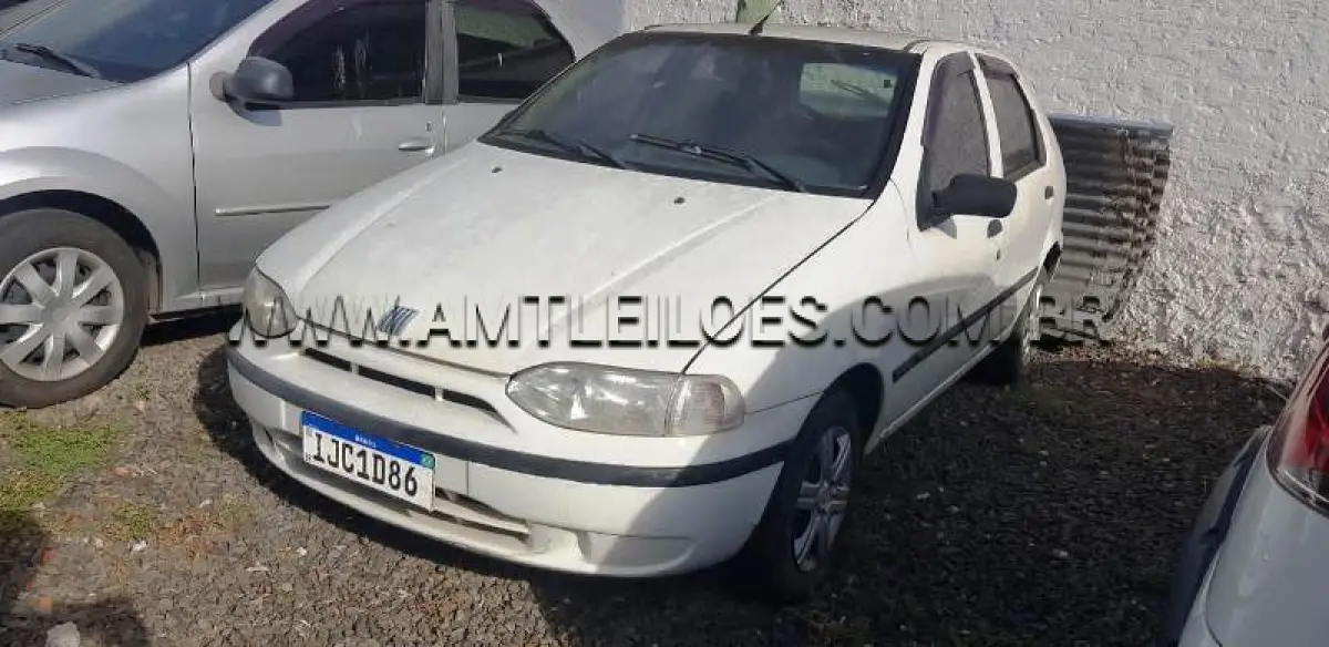 LOTE 012 - Espécie: AUTOMOVEL / Marca: FIAT / Modelo: PALIO EX / Placa: IJC1D86 / Ano fabricação: 1999 / Ano modelo: 1999 / Cor: BRANCA / Chassi: 9BD178296Y0923201 / Motor: 5790398 / Renavam: 00723038546